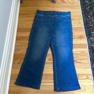 New Spanx kick flare pull in jeans in medium light wash